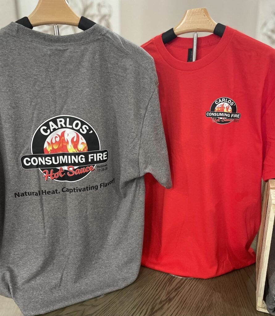 The Official Carlos’ Consuming Fire Signature T-Shirt