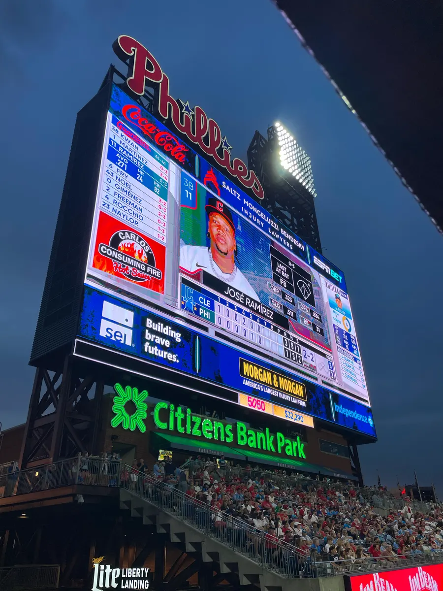 Carlos' Consuming Fire Hot Sauce logo on the jumbotron at Citizens Bank Park